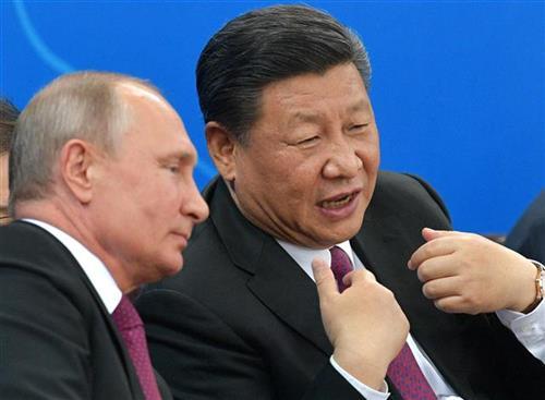 Putin sa Si Ðinpingom  foto: Alexei Druzhinin, Sputnik, Kremlin Pool Photo via AP